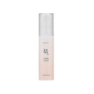 Beauty of Joseon Ginseng Moist Sun Serum bottle with golden cap on white background
